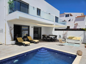 Ria Formosa Beach House, superior modern villa with pool, terrace, beach and sea view